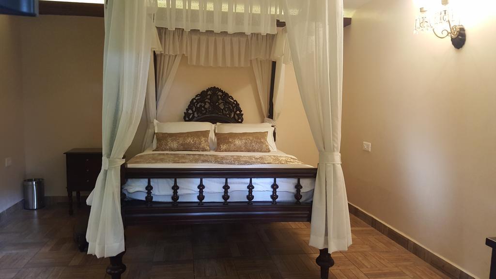 Casa Menezes - A Heritage Goan Homestay Бамболим Номер фото