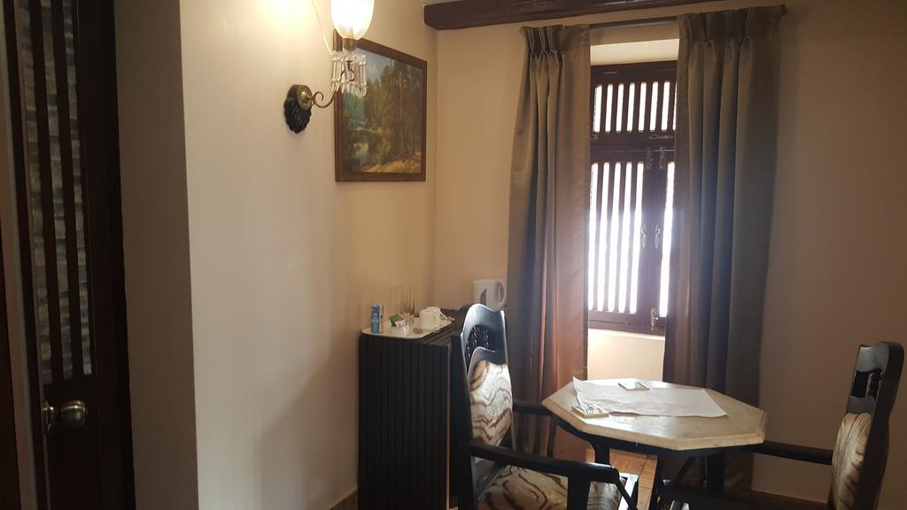 Casa Menezes - A Heritage Goan Homestay Бамболим Номер фото