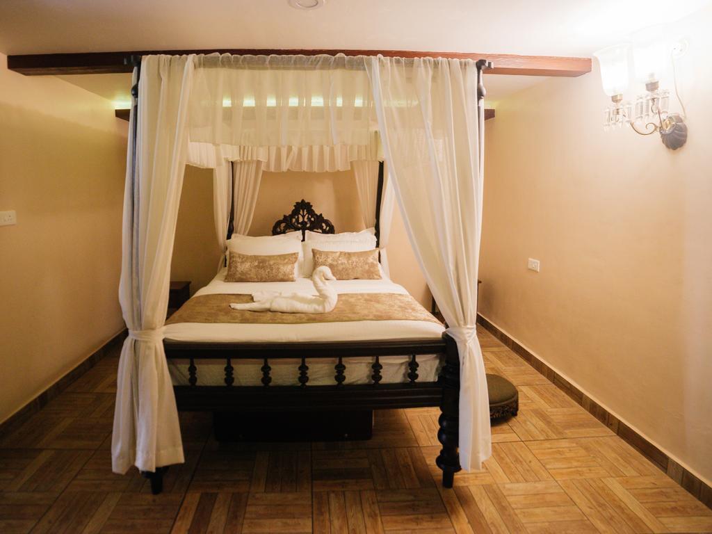Casa Menezes - A Heritage Goan Homestay Бамболим Экстерьер фото