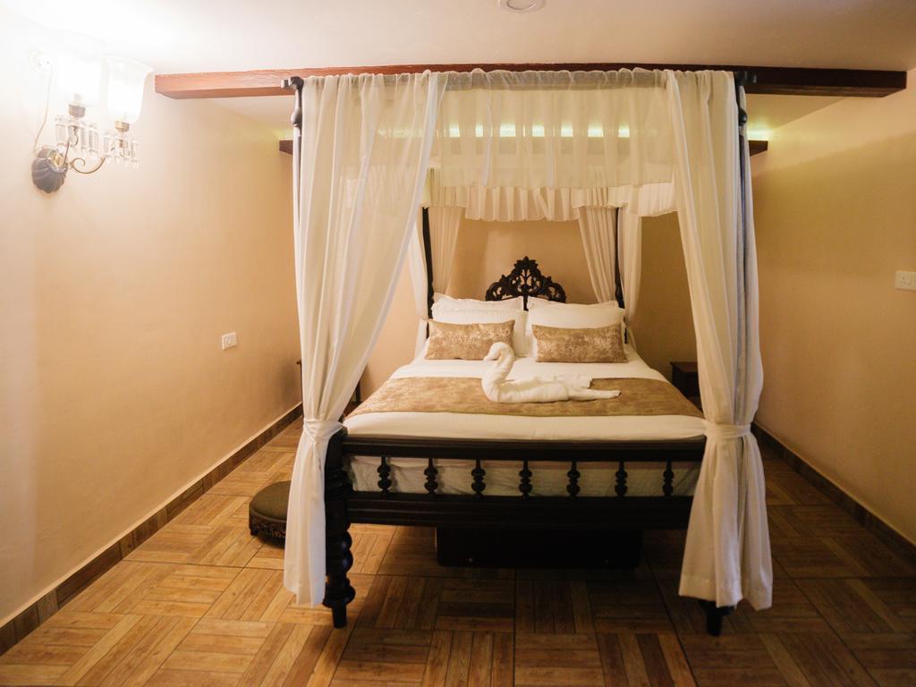 Casa Menezes - A Heritage Goan Homestay Бамболим Экстерьер фото